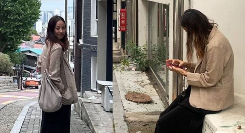 Lee Hyori Moves from Jeju to Seoul, Enjoys a Relaxing Stroll in Stylish Jacket and Skirt