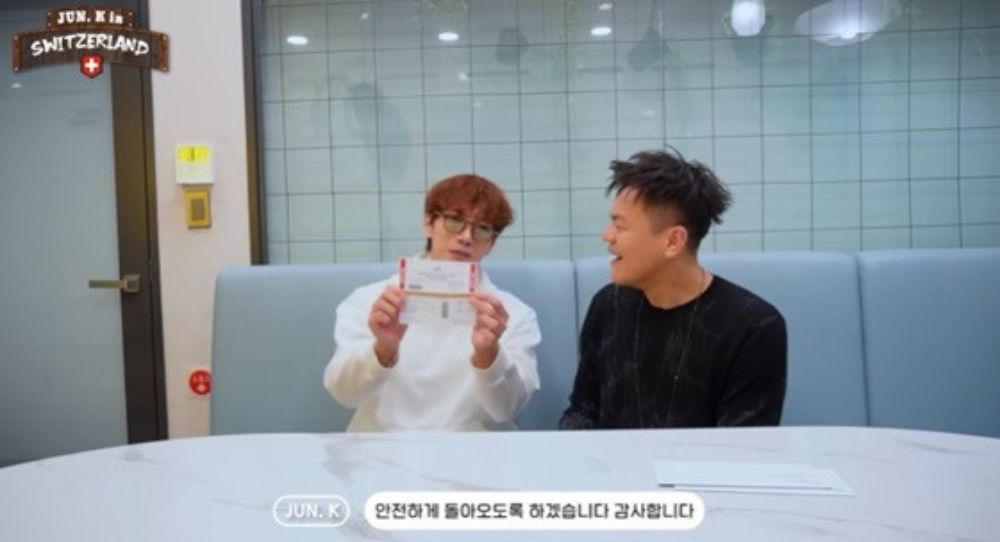 Park Jin Young Surprises 2PM's Jun. K with a Dream Swiss Trip Ticket for His 20th Anniversary